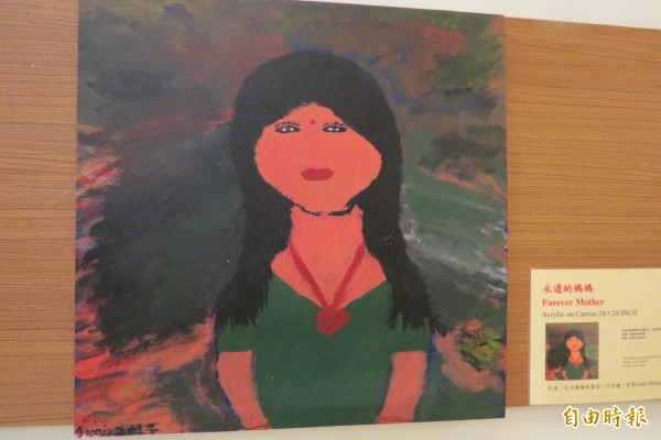 「癱瘓畫家」阿米爾．寶贊台中展畫作。（記者蘇孟娟攝）