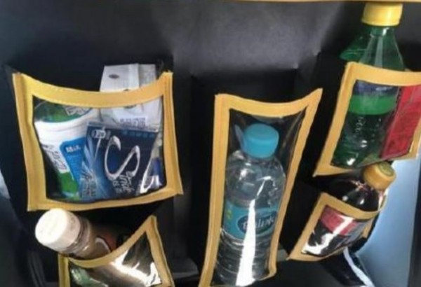 中國有些城市的計程車上開始賣起零食,讓乘客方便也讓司機收入進帳。(圖擷取自微博)
