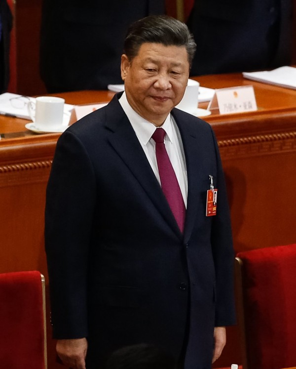 習近平即將稱帝,中國人代接受採訪時,屢屢稱此為「民主」。(歐新社)