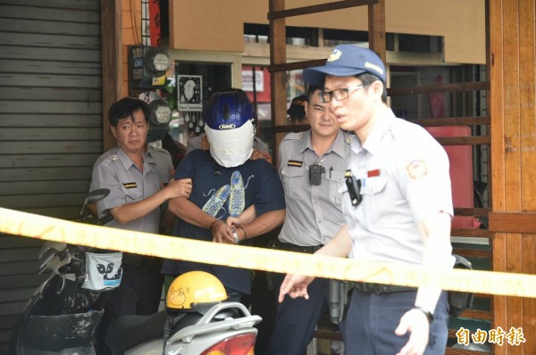 涉嫌砍殺妹妹的男子遭逮捕。(記者張忠義攝)