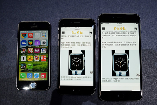 Apple 昨晚發表的 iPhone 6 Plus(右一)、iPhone 6 (中)與 iPhone 5s (左)比較。