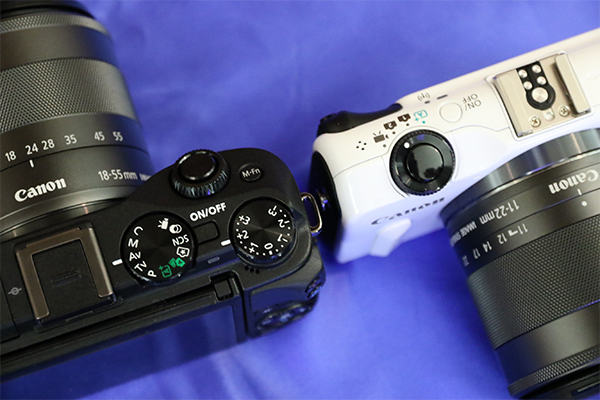 與上一代 EOS M2 比較:機身上方模式選擇,可以看出 M3 多出相當多手動模式