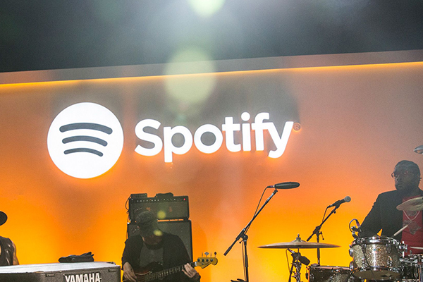 Apple Music 推出,免費串流音樂 Spotify 飽受威脅。(圖片來源/法新社)