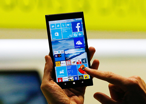 Windows Phone 的市佔率遲遲無法提升,很可能是 Stephen Elop 離開的主因(圖片來源/路透)