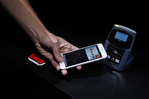 Joe Casabona 對 Touch ID、Passbook、Apple Pay 也都有高度評價。(歐新社)