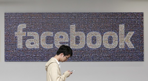 由於不是每篇文章都適合按讚,Facebook 用戶已經等待此功能很多年(圖片來源/美聯社)