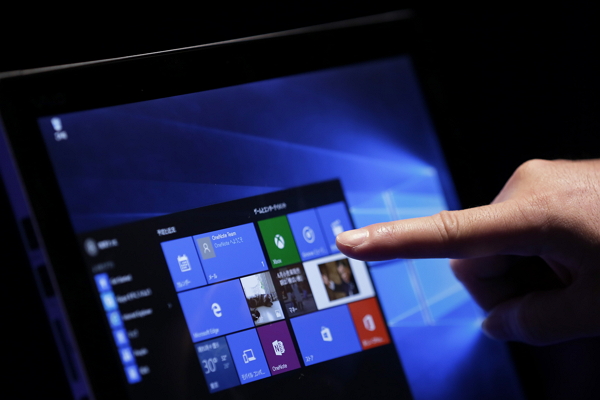 Windows 10 將會自動安裝!(圖片來源/彭博社)