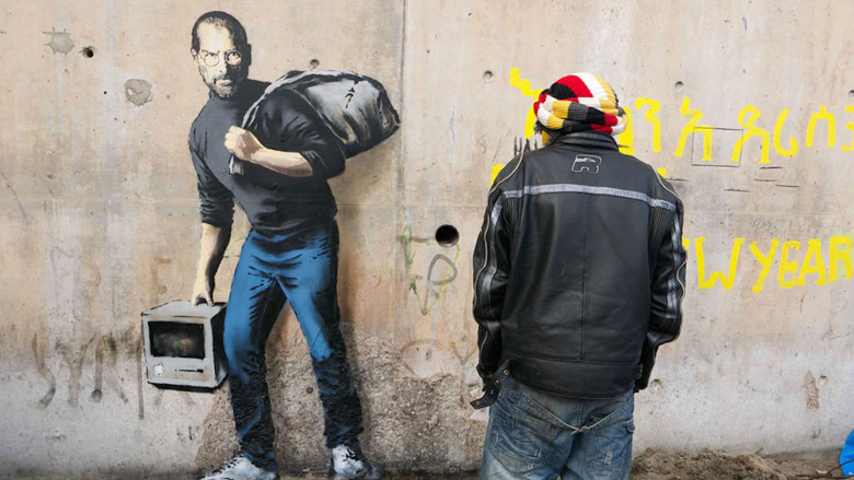法國難民營出現賈伯斯塗鴉,並在網上瘋傳(圖/Banksy)