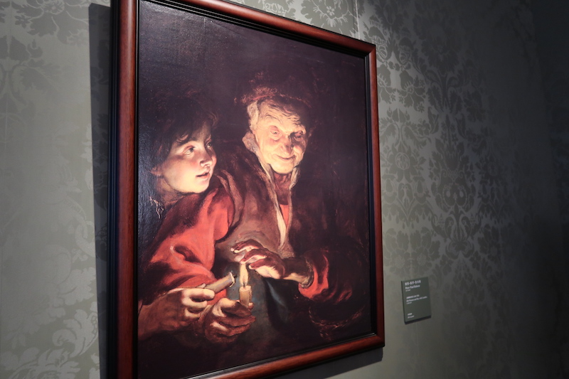 Canon 在現場展示了 17 世紀由彼得・保羅・魯本斯所繪製的木板油畫《點蠟燭的老婦人與小男孩》