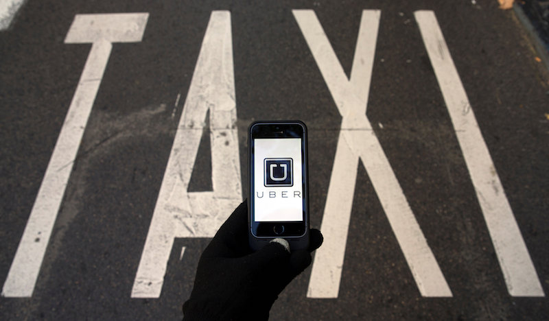 Uber 與傳統計程車業的大戰在全球各地都方興未艾（圖片來源／路透）