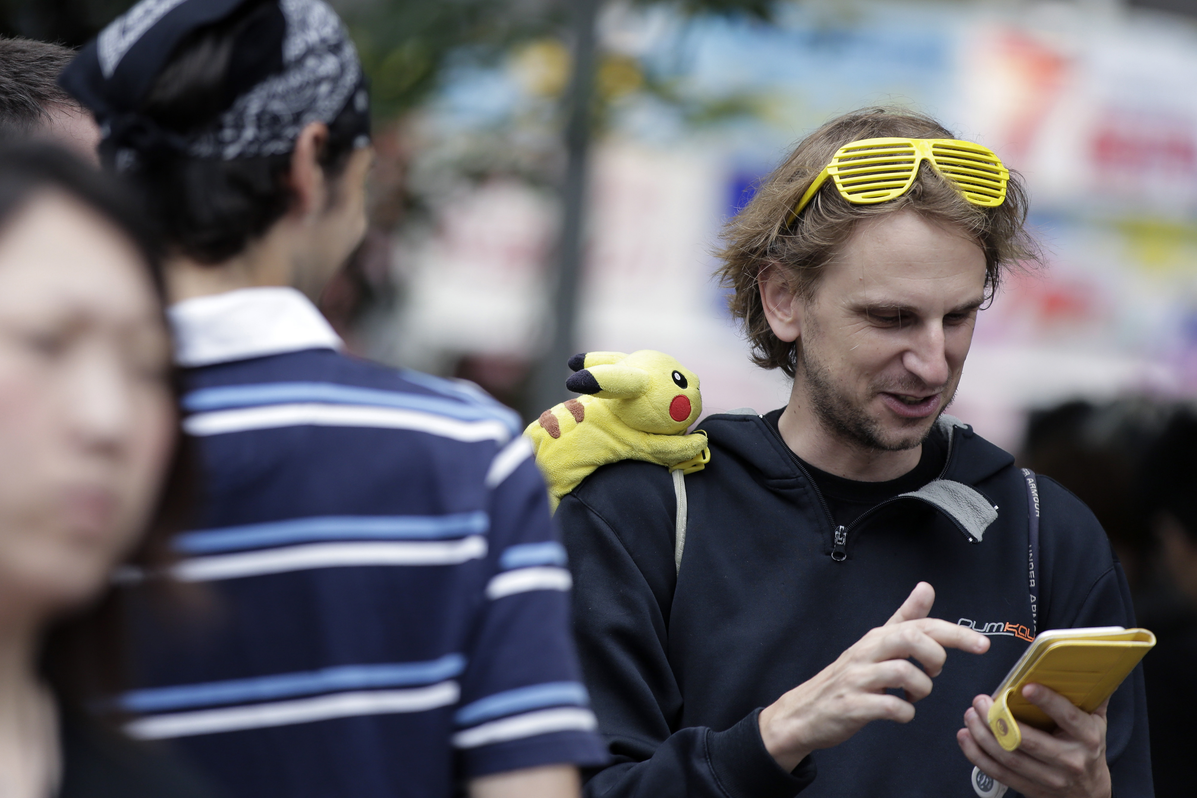 如果用這個邏輯來看的話,連現在最當紅的《Pokémon Go》,都是因 Apple 才有今日。(圖片來源/彭博社)
