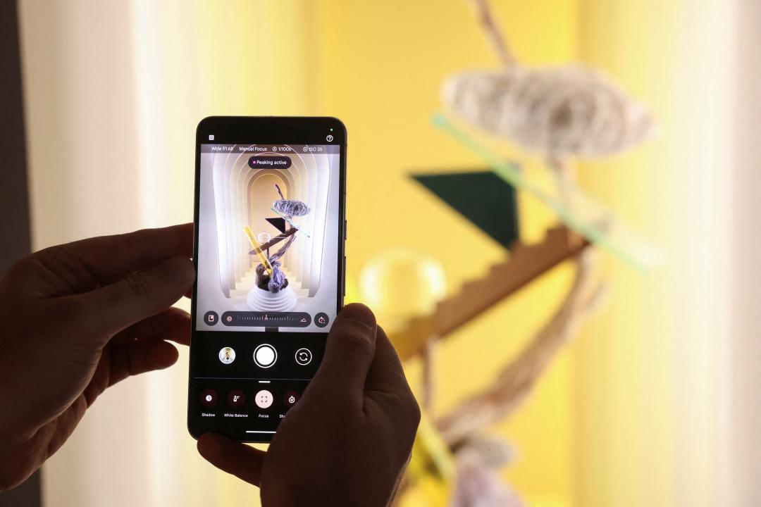 拍出好照片,軟硬體都很重要。(圖/美聯社)