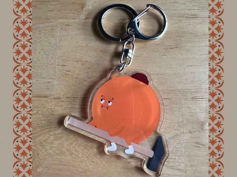 展期內只要於合作店家消費、或購買展場內綠工藝入選作品滿500元並登錄憑證，就能兌換「誠實君」限量周邊鑰匙圈。（工藝中心提供）