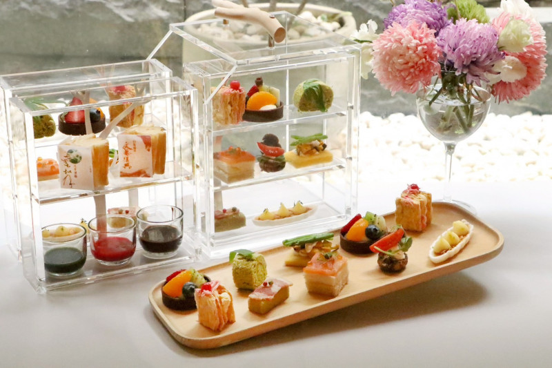 北投大地與礁溪寒沐今夏合作推出住房專案，可享雙人兩晚住宿、早餐、下午茶及多樣設施體驗。（北投大地酒店提供）