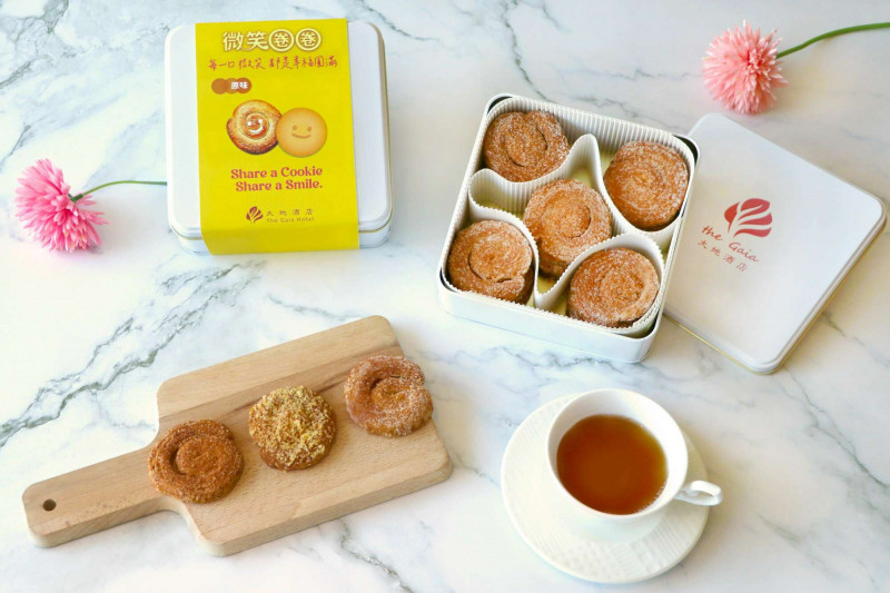 「微笑圈圈」即日起至10月1日限時販售，買10盒送1盒。（大地酒店提供）