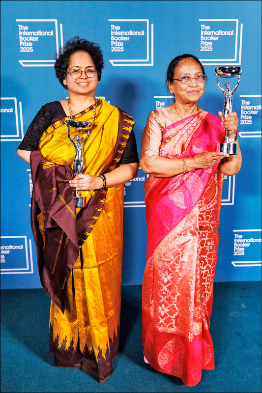 穆斯塔克（右）與巴斯提。（歐新社）