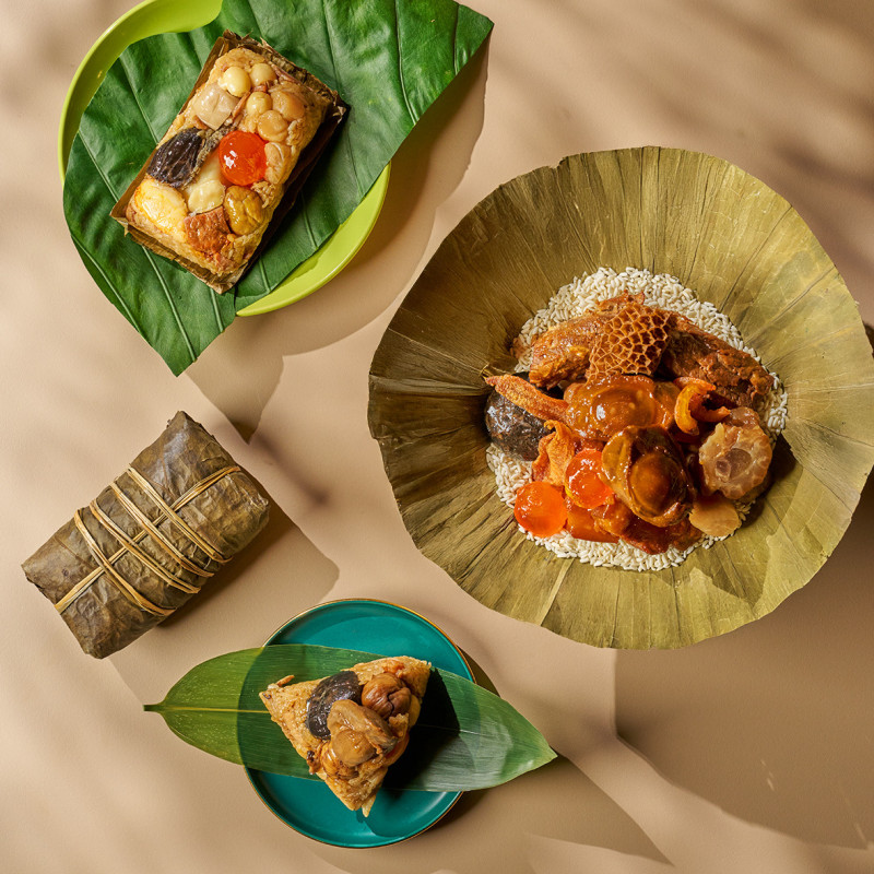 以江浙菜聞名的江南春餐廳，今年推出「古早味飄香粽」、「辣味犇粽」與「滬式鮑魚干貝粽」3款手工粽。（台北福華大飯店提供）