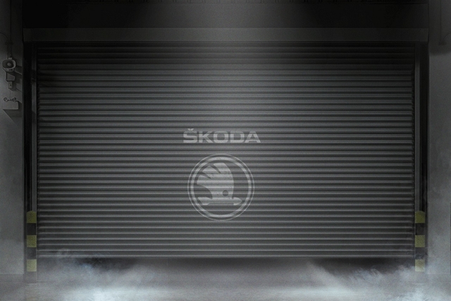 Skoda日前在官方臉書粉絲團貼上了一張車庫鐵捲門的照片，同時表示車庫裡頭將會有個「大東西」登場，以故作玄虛的方式想讓車迷們猜猜看。（圖片來源／Skoda）