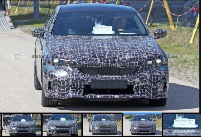 另一款測試車雖以偽裝覆蓋，但從車內文件得知是高階的 i5 M60 車型。
