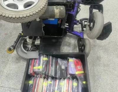 用輪椅走私逾百支手機 入境中國被逮