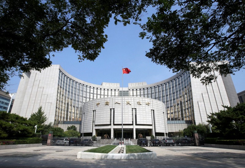 中國人行大舉收購黃金，去年12月恢復買進至今，以買近百噸。（路透）