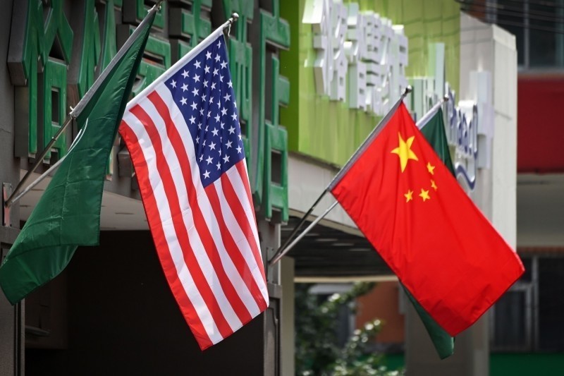 近期美中談判頻傳佳音，帶動全球景氣回溫，但工研院產科國際所總監楊瑞臨認為，儘管美中貿易談判好轉，但雙方角力態勢仍將在科技、金融領域另闢戰場，成為經濟一大變數。（示意圖，法新社資料照）