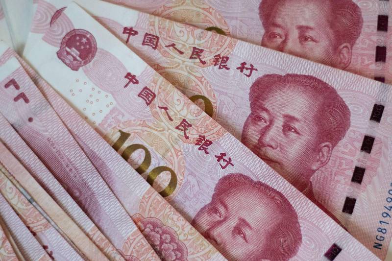 瑞穗銀行亞洲首席策略師張建泰表示,中國當局在加重支持國內市場的政策下,考慮到貿易對經濟增長的作用,以及為了留住外資,將不會採用貨幣貶值政策。(法新社)