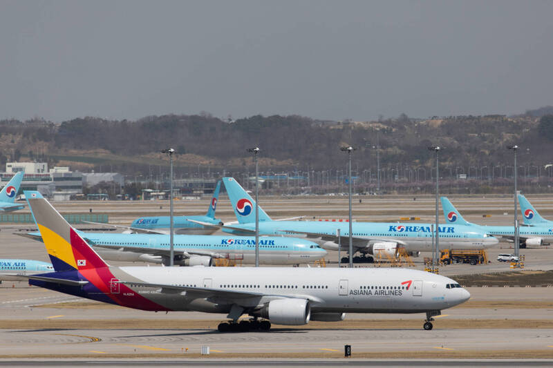 大韓航空與韓亞航空是南韓2間最大的航空公司,現在2間航空公司有可能被合併。(彭博)