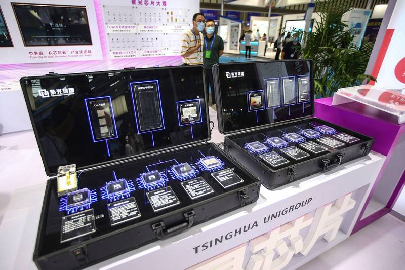 紫光正在積極尋找債務解決方案。圖為2020年世界半導體大會紫光參展。（路透）