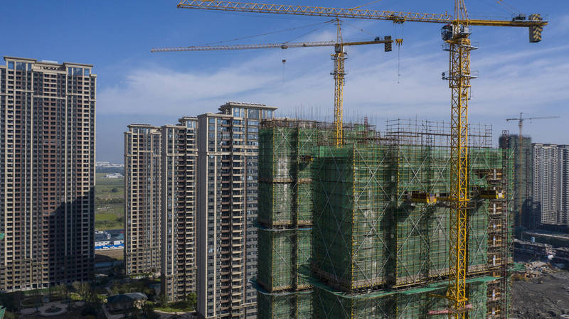 房地產專家認為,中國房地產業必須有更多企業退出產業,才能維持經濟健康穩定。(彭博資料照)
