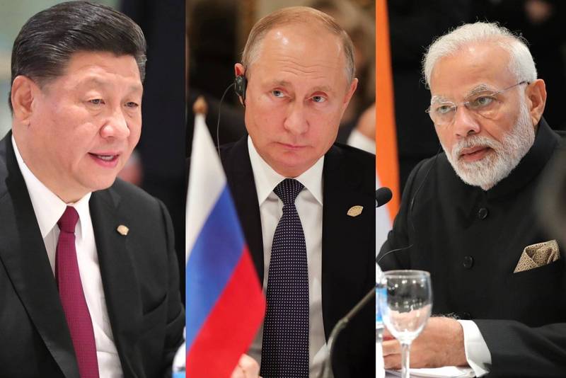 中、印大買低價俄油。由左至右分別為中國領導人習近平、俄羅斯總統普廷、印度總理莫迪。（歐新社，本報合成）