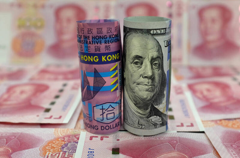 香港實施聯滙制度，與美元掛鉤，避免匯率出現大幅震盪。（路透）