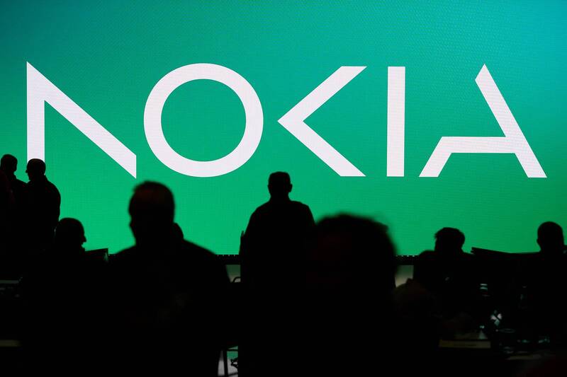 Nokia全新Logo捨棄原本的藍白色調，英文字母簡化部分筆畫，打造充滿科技感的清新形象。（法新社）