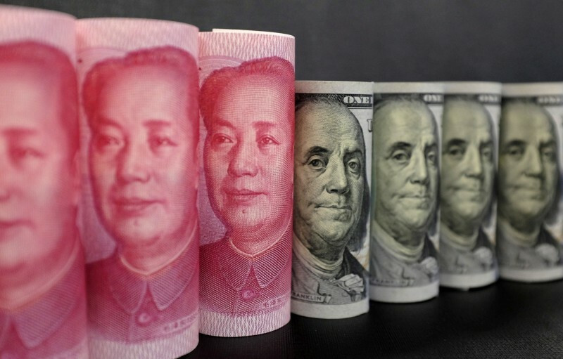 11月中國金融市場外逃的資金高達457億美元（台幣1.49兆元），創有史以來單月最大。（路透）