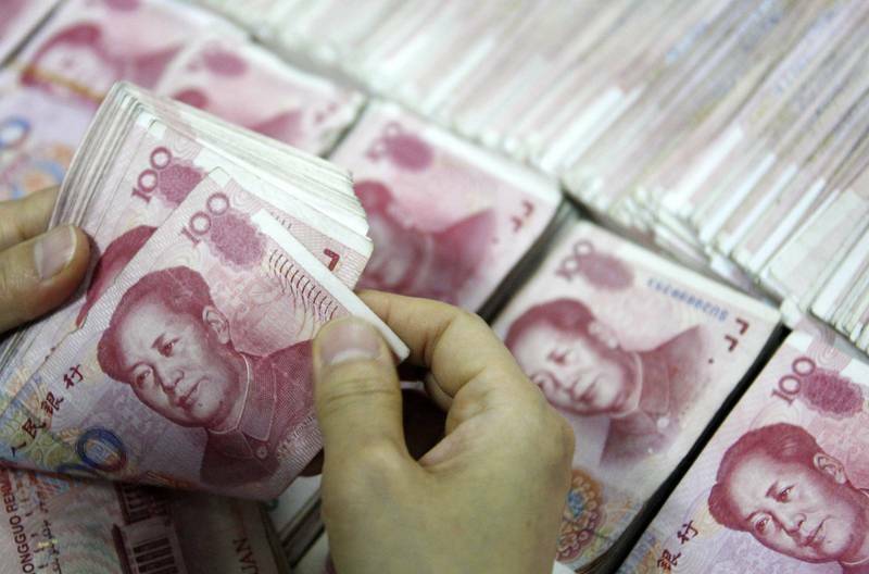 高盛預估，人民幣匯率每升值1%，可推動A股上漲3%。（示意圖，法新社）