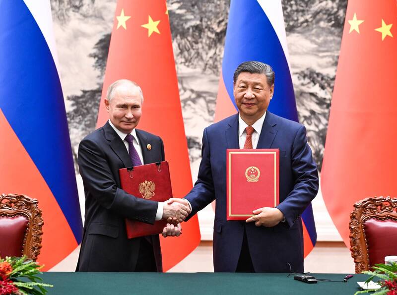 專家認為，川普不斷升級對金磚國家的威脅，中俄2國試圖藉由金磚國家推翻美元的陰謀失敗了。（歐新社）