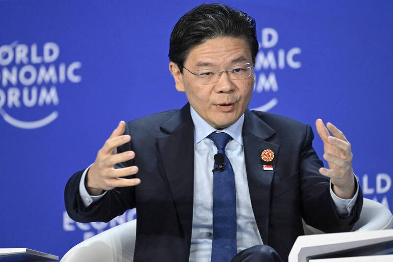 黃循財7月29日表示，雖然美國設定的10%基準關稅並非理想方案，但這是新加坡「可以接受」的水準。（法新社）
