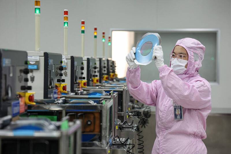 中國政府補貼扶植下，中國晶片產業在成熟製程領域快速成長。（法新社資料照）