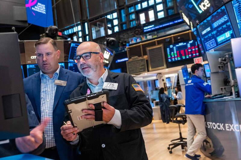 美股主要指數29日收盤各有漲跌。(法新社)