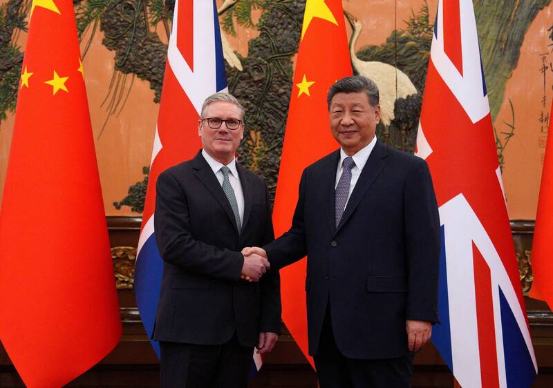 英國首相施凱爾29日與中國領導人習近平會面。（路透）