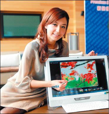 微星21.5吋多點觸控All-in-One桌機AE2220，具省電、美型特色，售價36,900元。