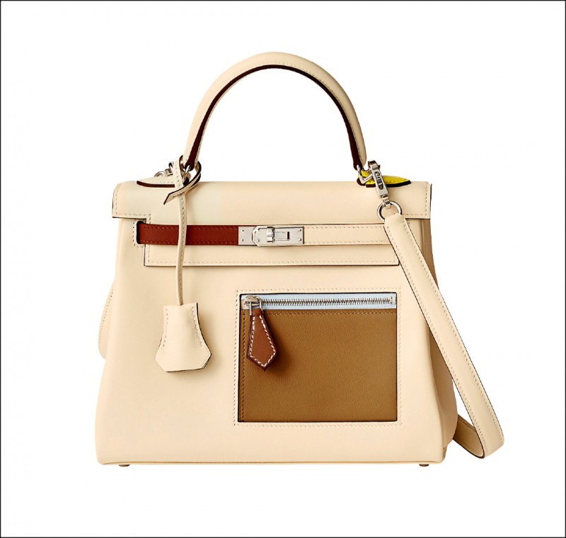 這款Kelly Colormatic以Swift小牛皮撞色並增添拉鍊夾層等功能，再次拉寬時尚經典範疇，堪稱本季夢幻包。446,400元。