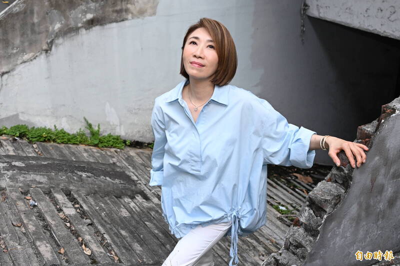 李翊君完成碩士學位，感謝家人全力支持。（記者胡舜翔攝）