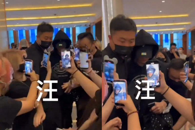 TXT秀彬被粉絲團團包圍，在保鑣的護衛下前往電梯。（翻攝自微博）