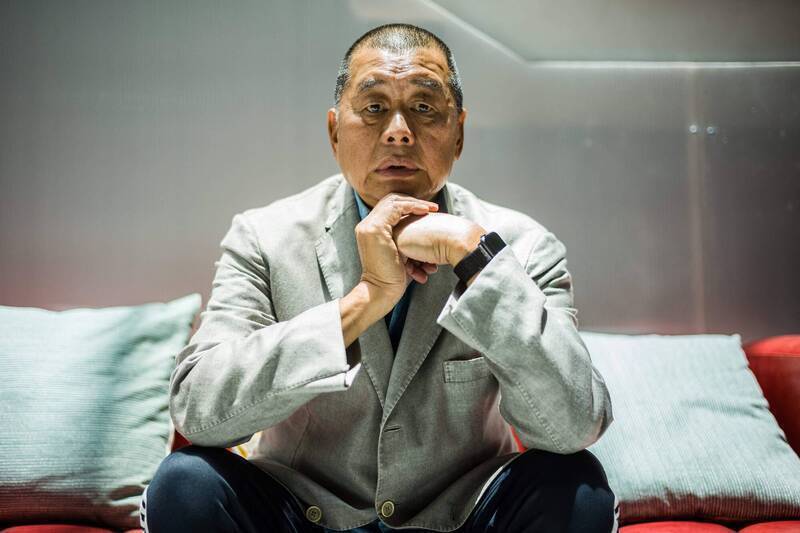 香港壹傳媒創辦人黎智英9日遭香港法院重判20年徒刑。照片攝於2020年6月，正值《港區國安法》實施前夕，當時黎智英雖知大難將至，仍選擇留守香港。（法新社資料照）