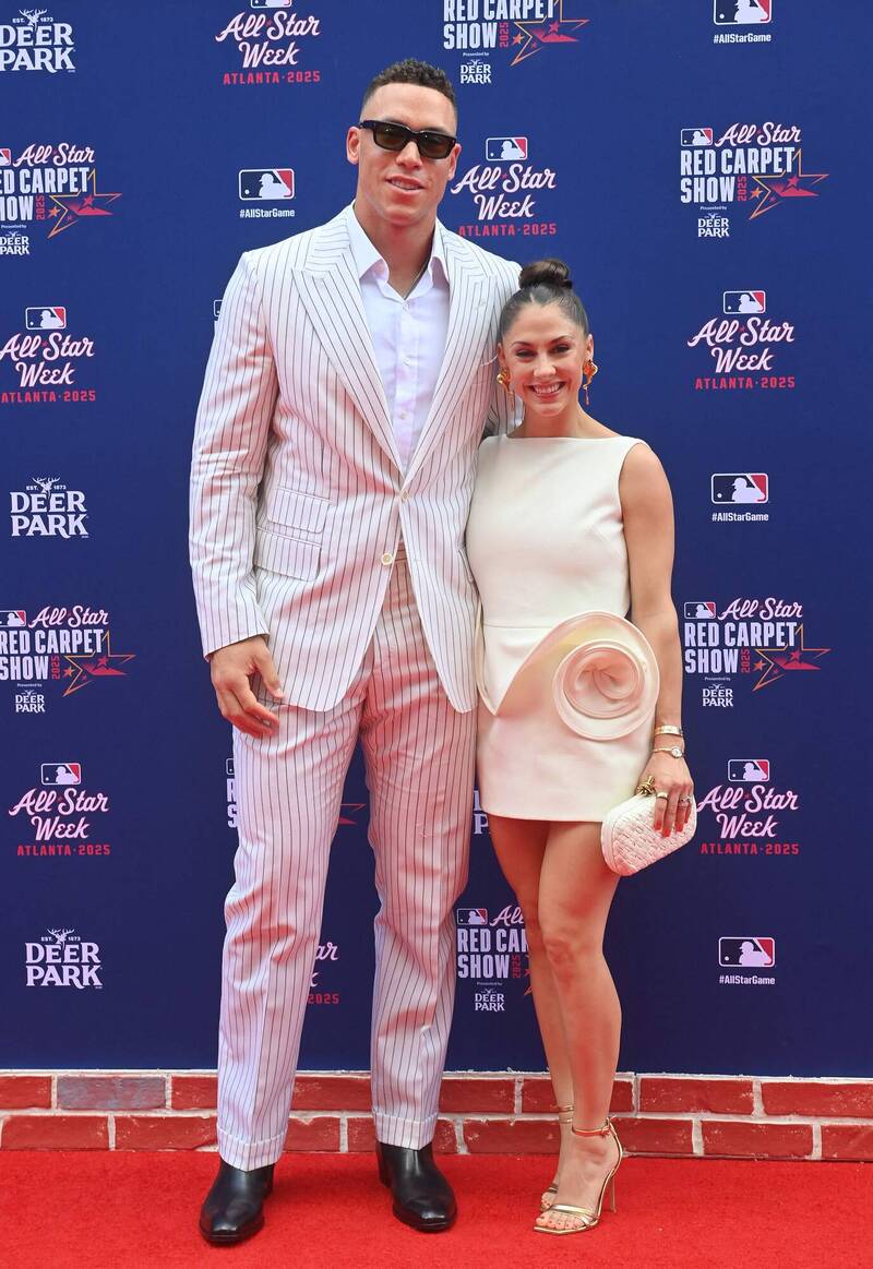 美國隊隊長「法官」Aaron Judgevo和老婆Samantha Bracksieck是高中情侶。（法新社）