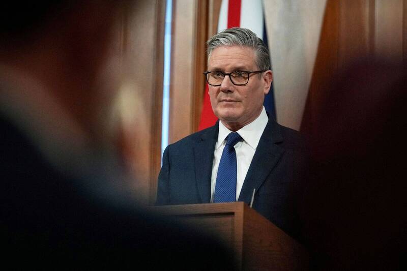 英國首相施凱爾。（路透）