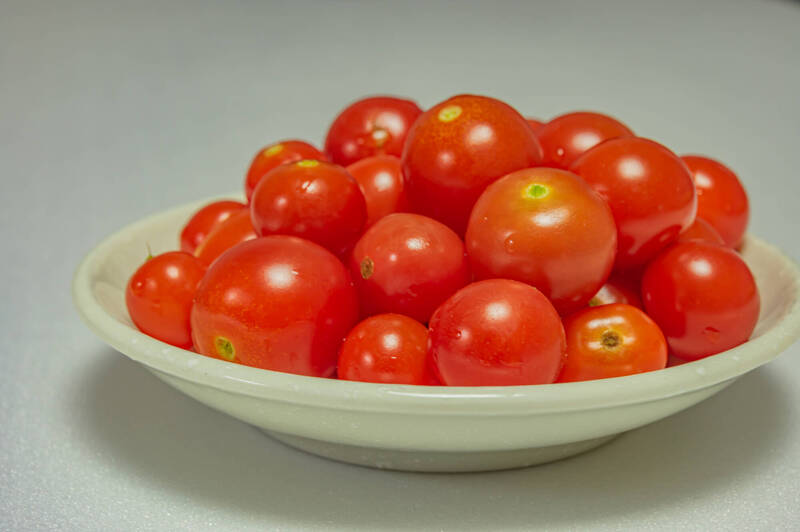 可選擇低小番茄等低GI水果做點心,減少血糖震盪,也避免影響正餐食慾與睡眠品質。(圖擷取自photoAC) 可選擇低小番茄等低GI水果做點心,減少血糖震盪,也避免影響正餐食慾與睡眠品質。(圖擷取自photoAC)