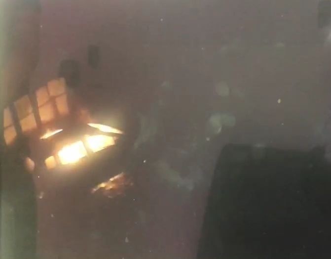 民眾監視器拍到,停在空地的休旅車突然起火燃燒。(記者陳建志翻攝) 民眾監視器拍到,停在空地的休旅車突然起火燃燒。(記者陳建志翻攝)