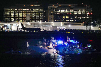 《TAIPEI TIMES》 US plane with 64 onboard, chopper collide